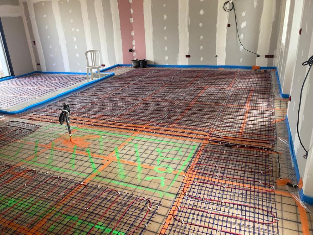 Pose de plancher chauffant électrique dans une maison neuve en Charente-Maritime